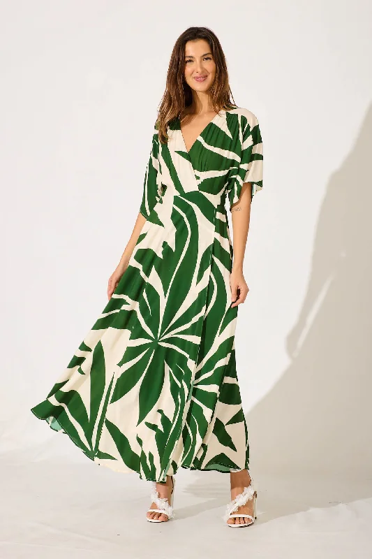 Sheath maxi dresses with beaded embellishments for a formal evening eventRondi Maxi Wrap Dress In Khaki With Cream Leaf Print