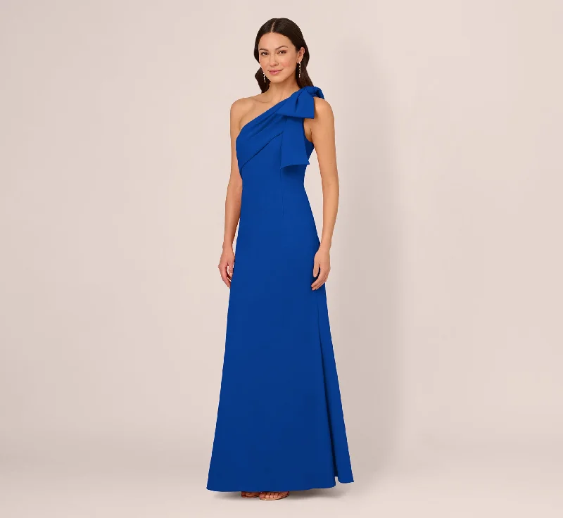 Maxi dresses with ruffled sleeves and bow accents for a sweet and charming lookStretch Crepe One Shoulder Mermaid Gown With Bow Accent In Violet Cobalt