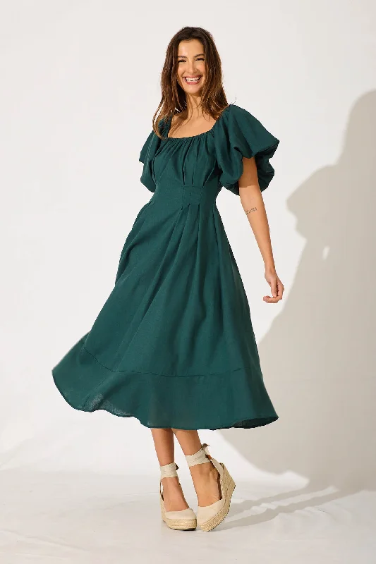 Maxi dresses with tiered lace skirts and off - the - shoulder necklines for a feminine and elegant beach lookWintour Maxi Dress In Emerald Linen Blend