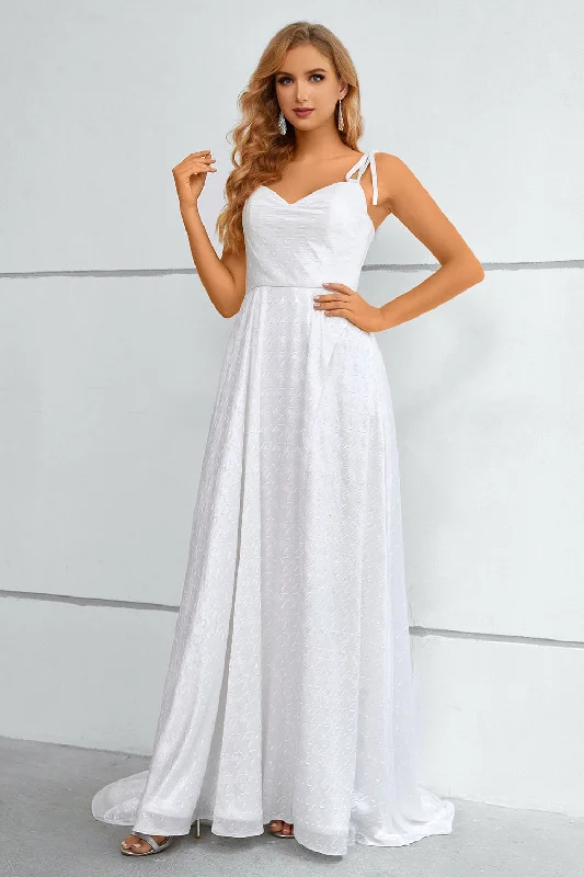 Cocktail dresses with a ruched bodice and spaghetti strapsWhite Spaghetti Straps Bowknot Prom Dress With Slit