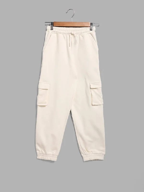 Jeanette Women Shorts with a Soft and Comfortable FeelY&F Kids Off White Solid Cargo Joggers